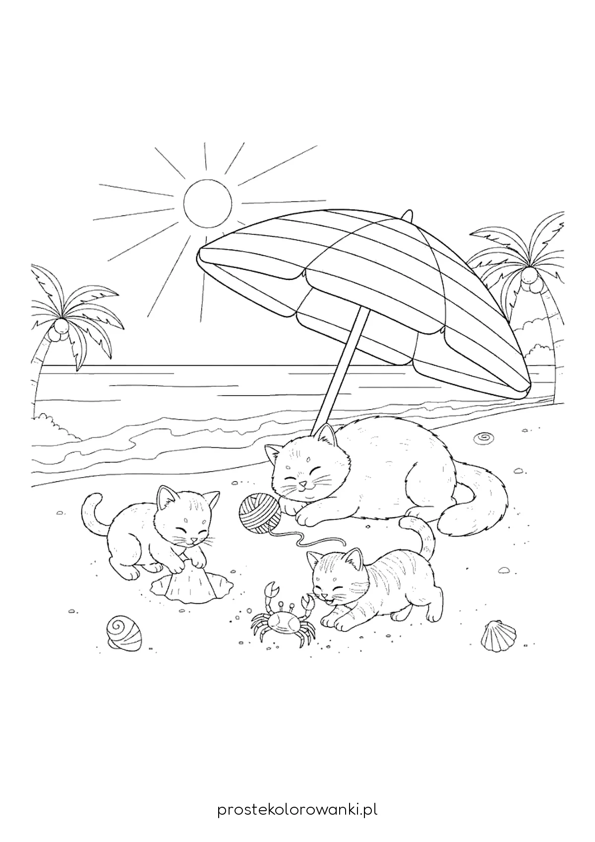 Kotki na plaży pod parasolem
